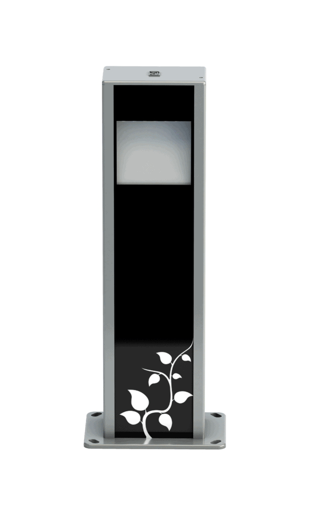 A rectangular outdoor light fixture with a black front panel, displaying a white vine and leaf design at the bottom, is mounted on a gray base—perfect for adding lumea-inspired elegance to any space.