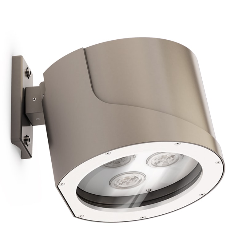 Close-up view of a modern, cylindrical outdoor wall-mounted LED light fixture from the Irys collection, featuring a metallic finish and three visible LED bulbs.